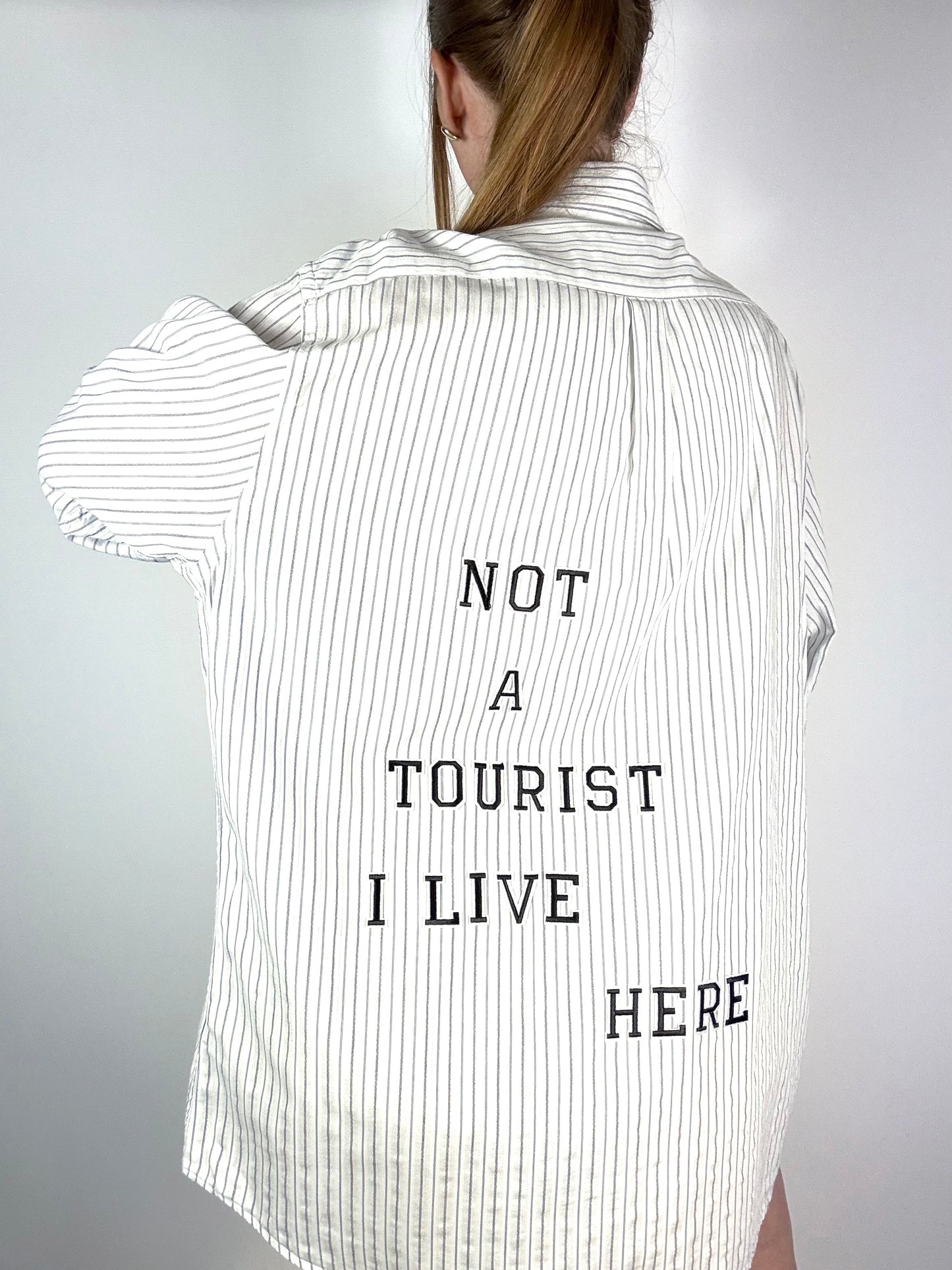 Camicia righe ‘Not a tourist’ tg.L