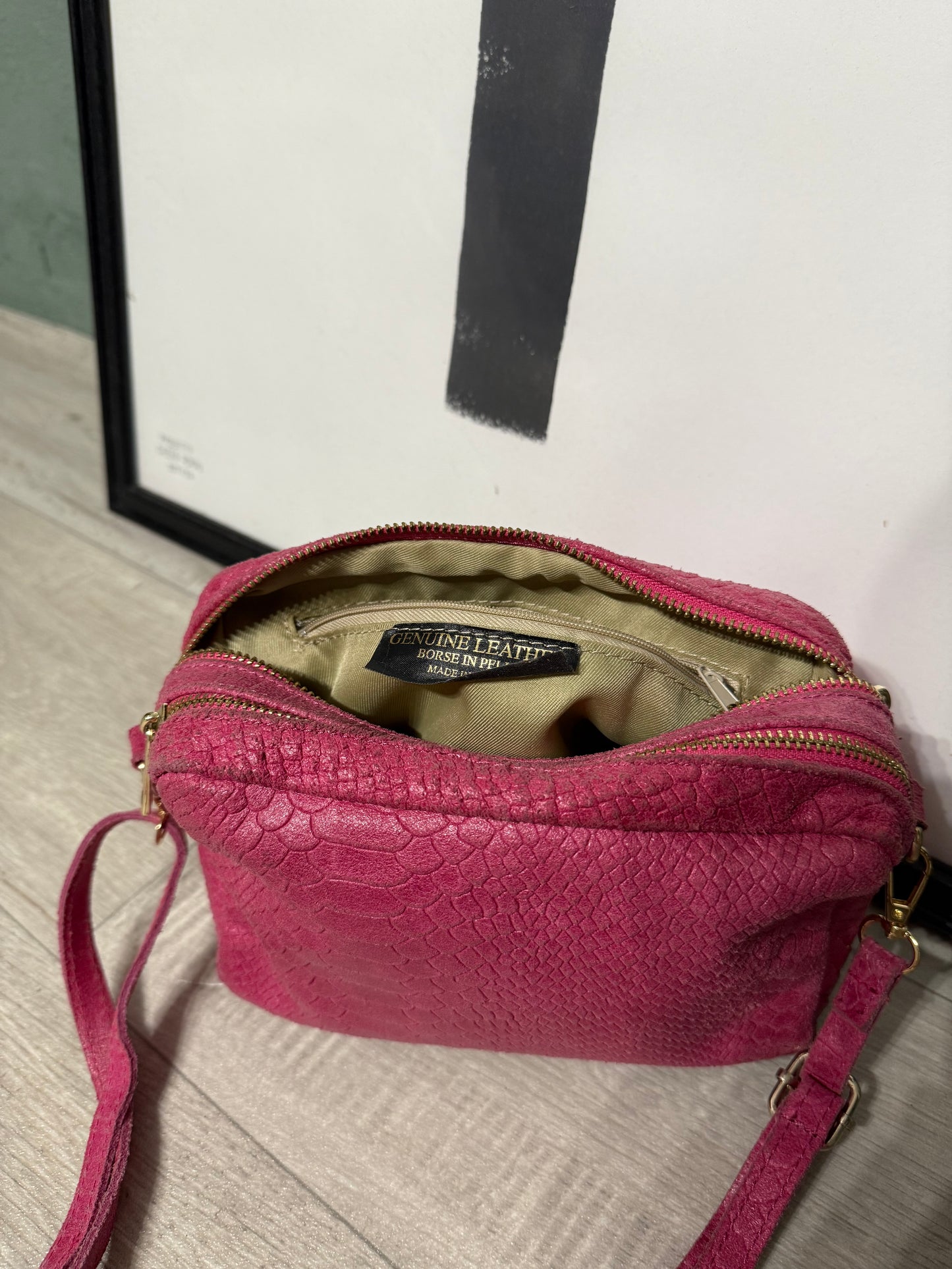 Pochette stampa cocco in pelle