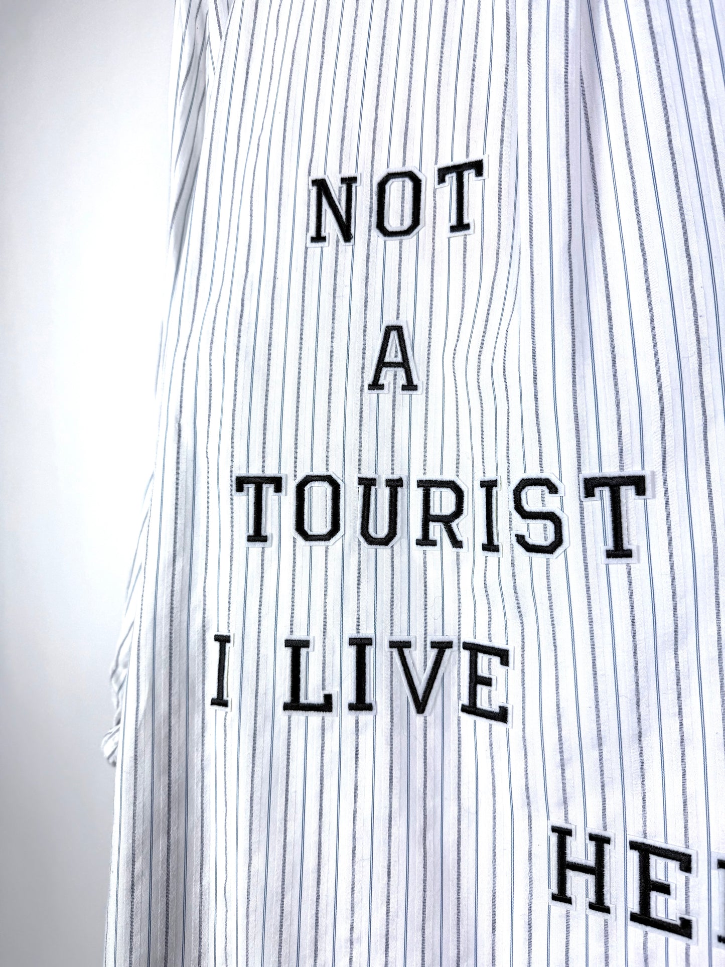 Camicia righe ‘Not a tourist’ tg.L