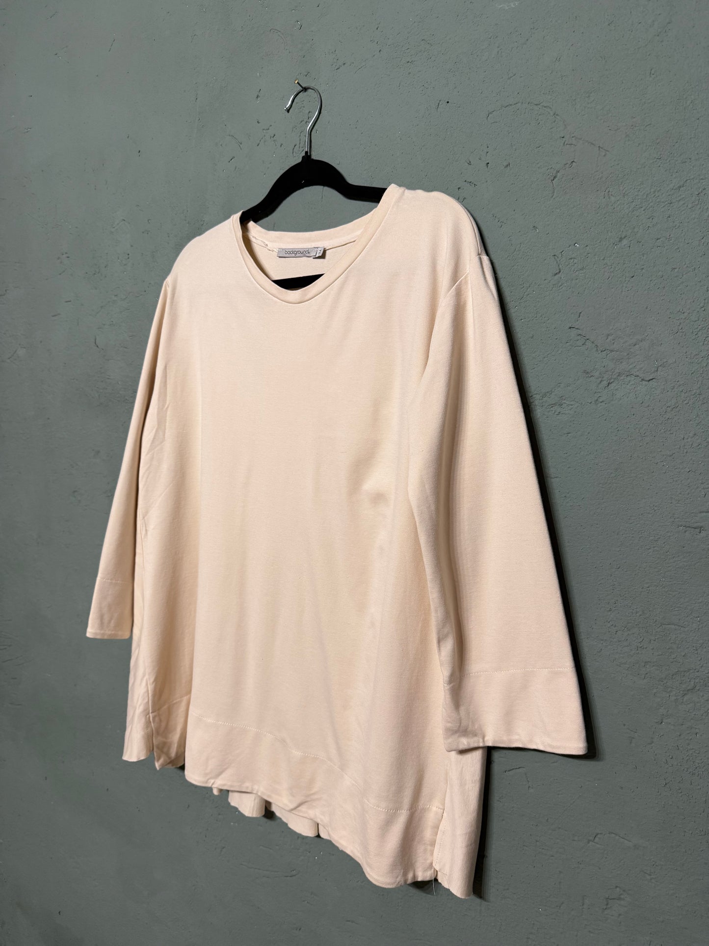 Maglia asimmetrica plisse Background