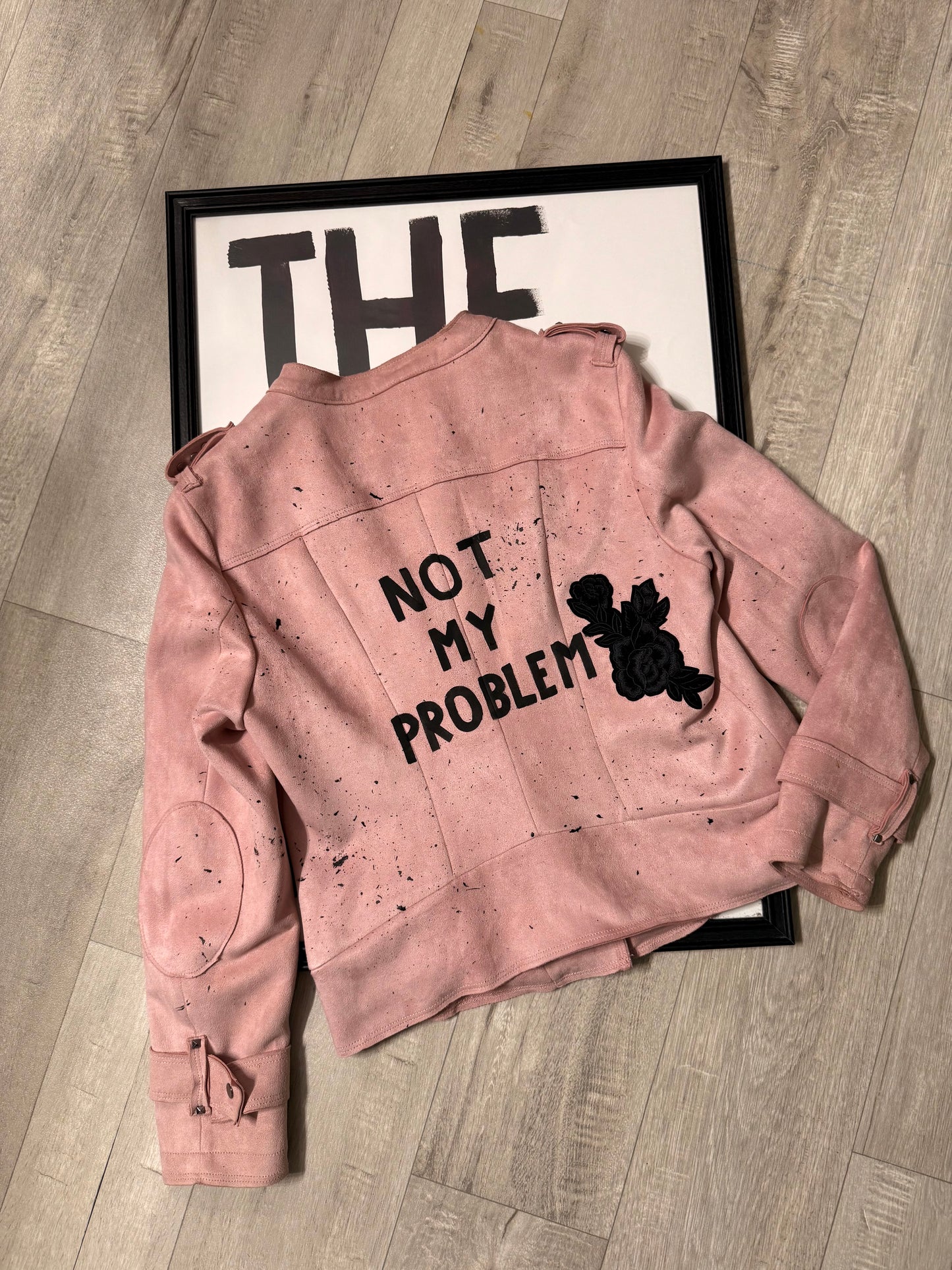 Giacca chiodo similpelle ‘Not my problem’