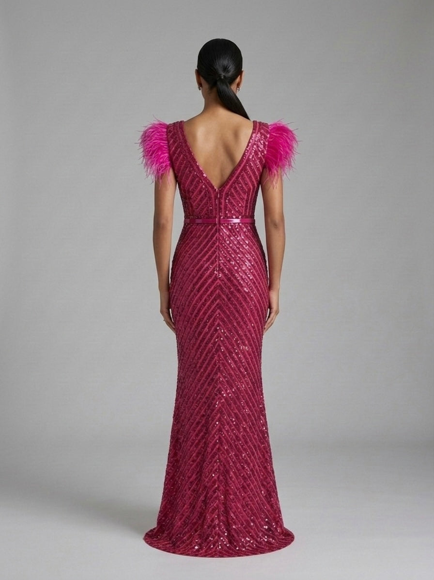 Abito longuette piume paillettes fucsia