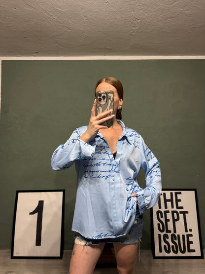 Blusa frasi