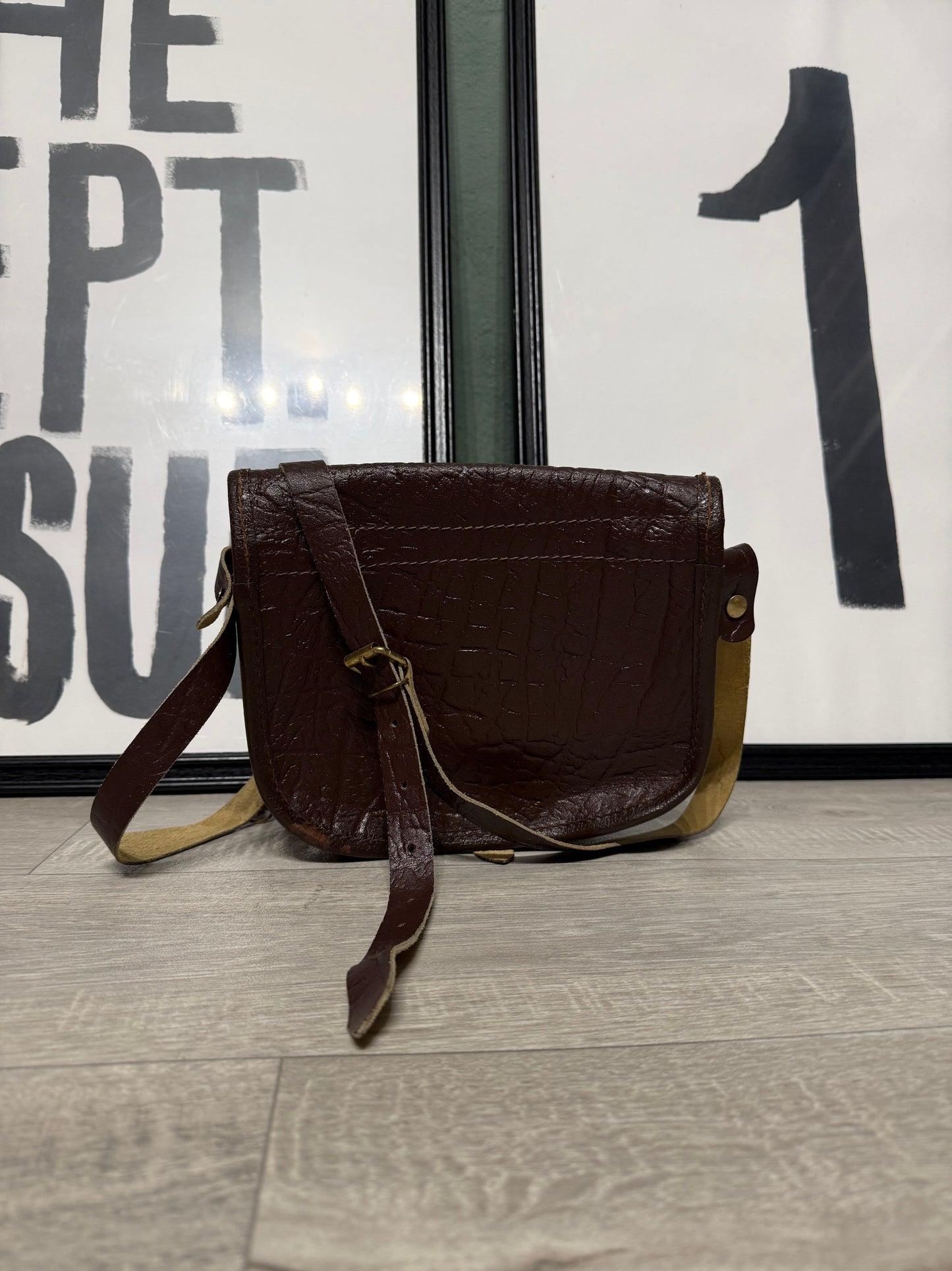 Pochette vintage tracolla in pelle