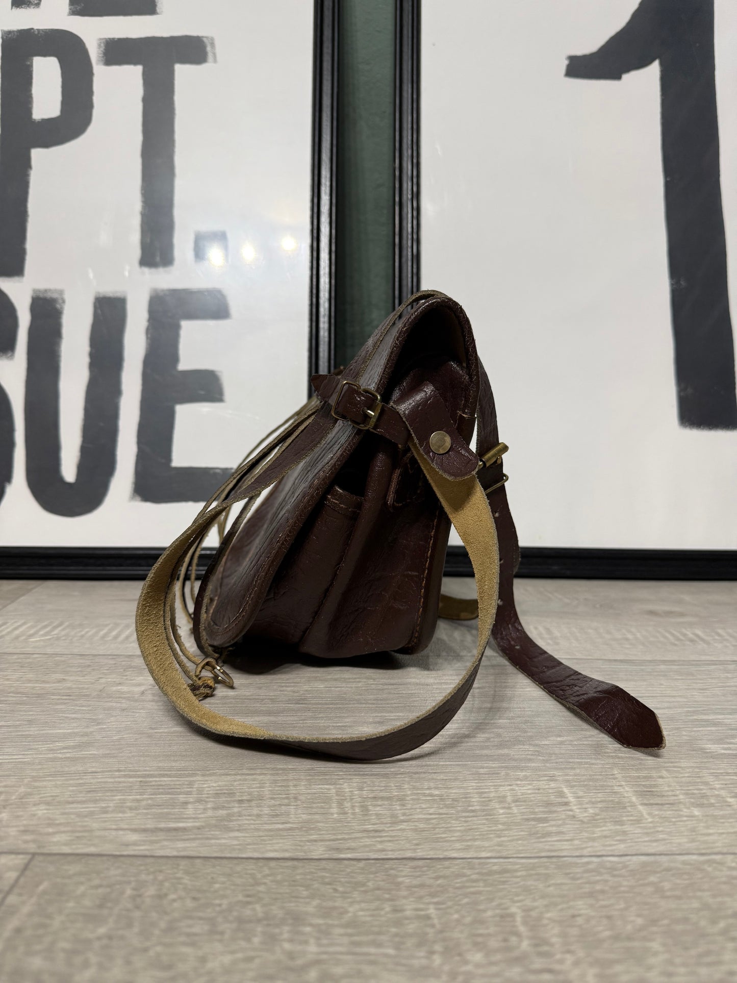 Pochette vintage tracolla in pelle