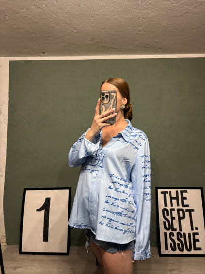 Blusa frasi