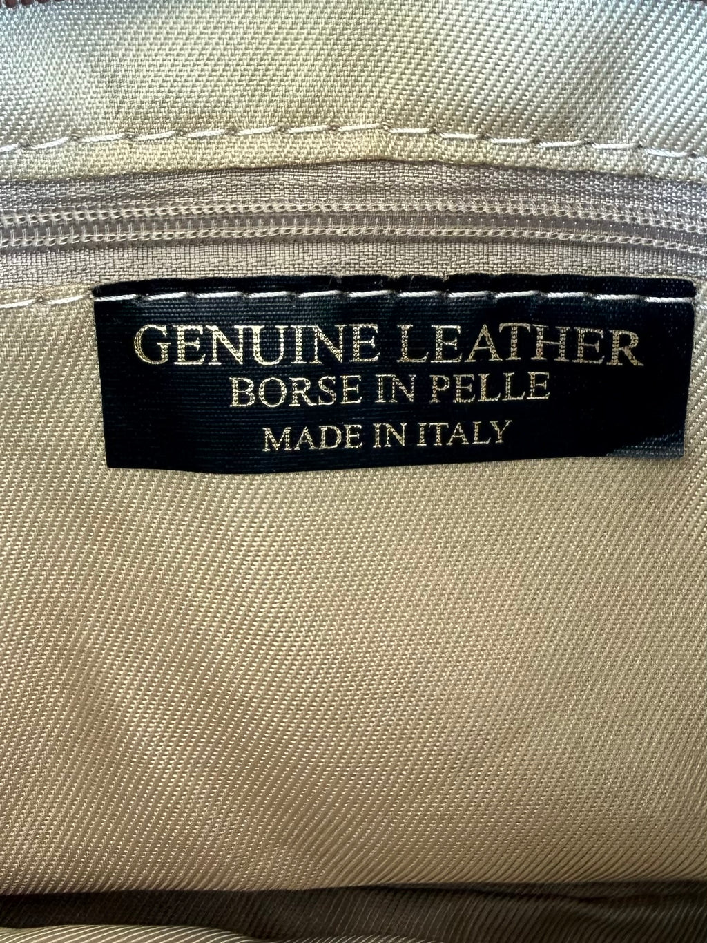 Borsa in pelle ‘Contiene sbalzi d’umore’