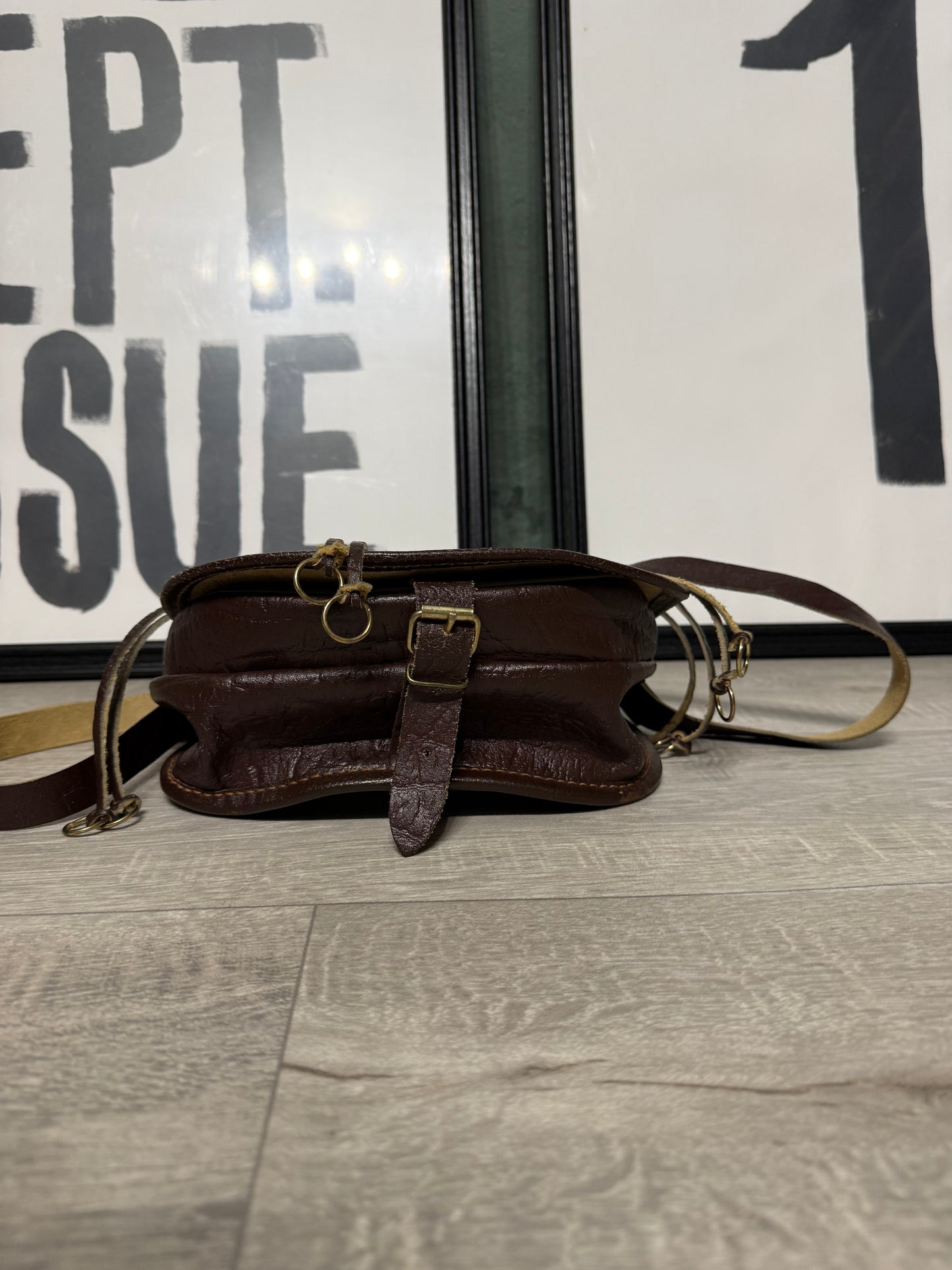 Pochette vintage tracolla in pelle