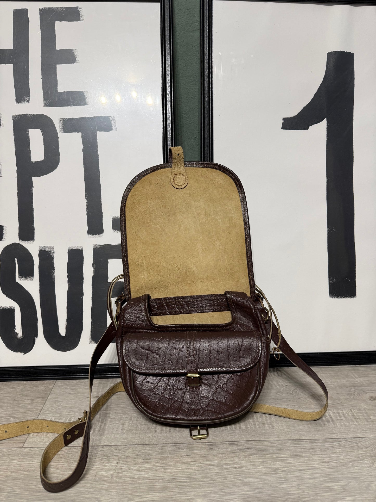 Pochette vintage tracolla in pelle