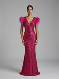 Abito longuette piume paillettes fucsia