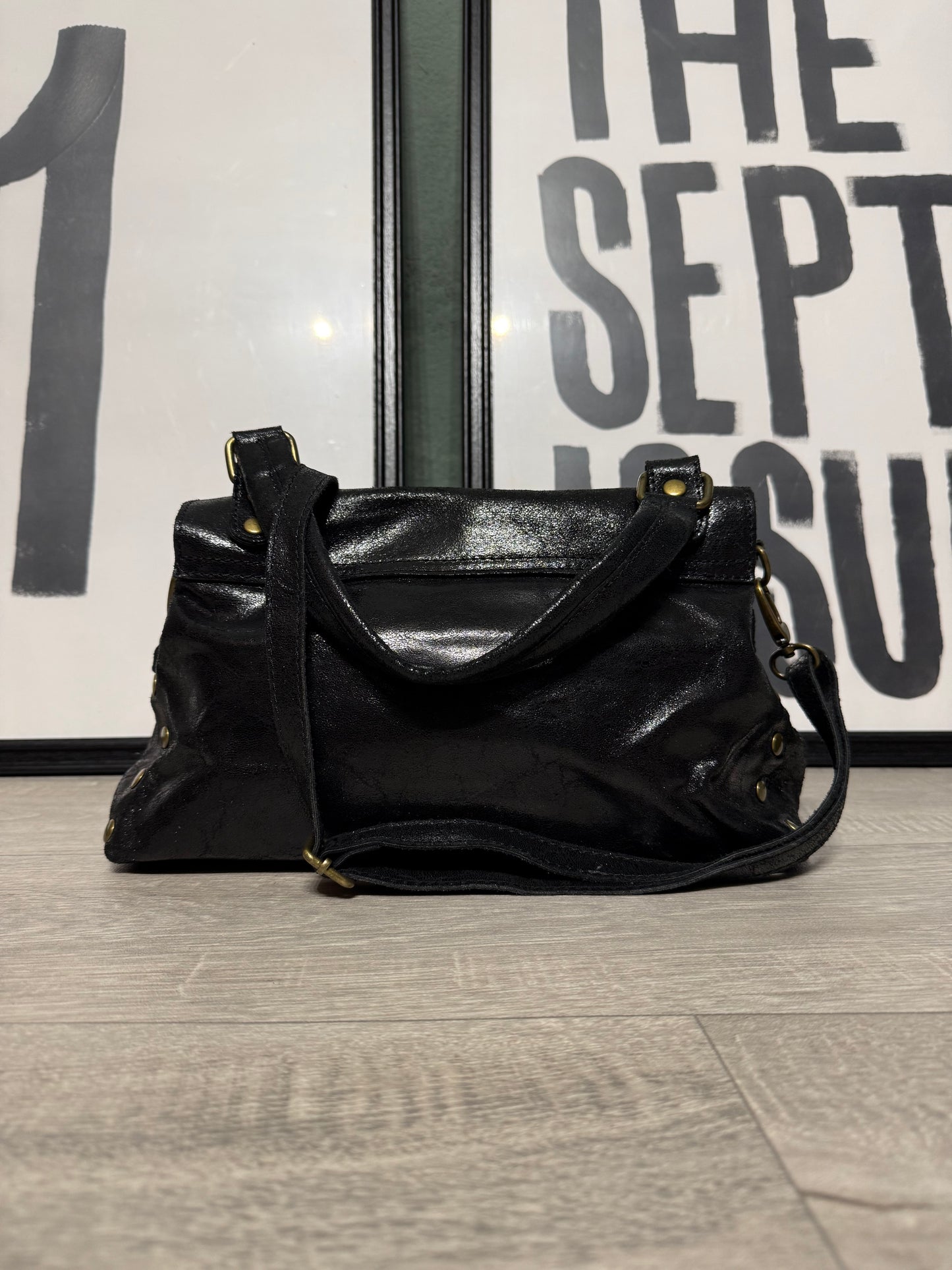 Postina in pelle con tracolla