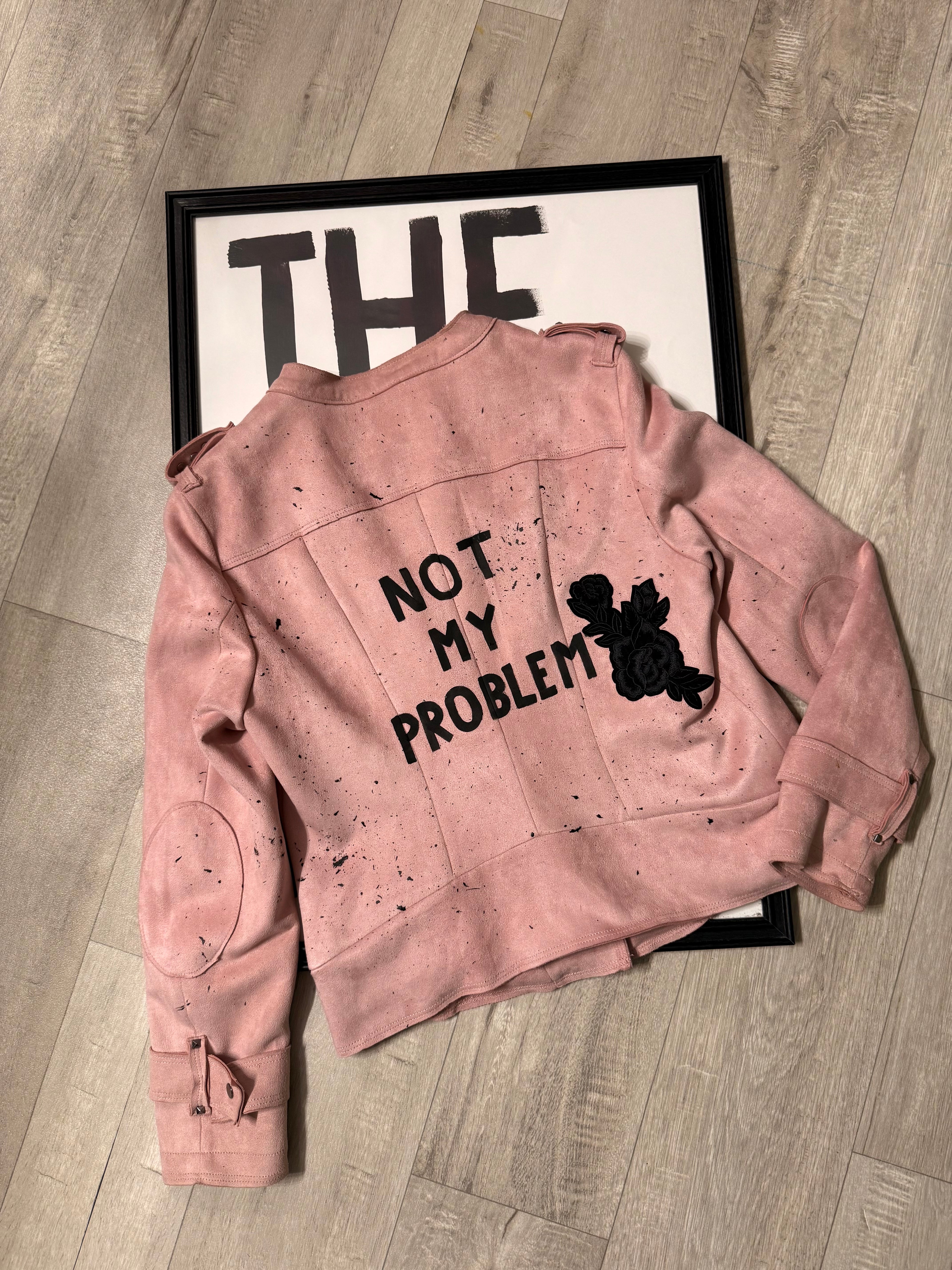 Giacca chiodo similpelle ‘Not my problem’