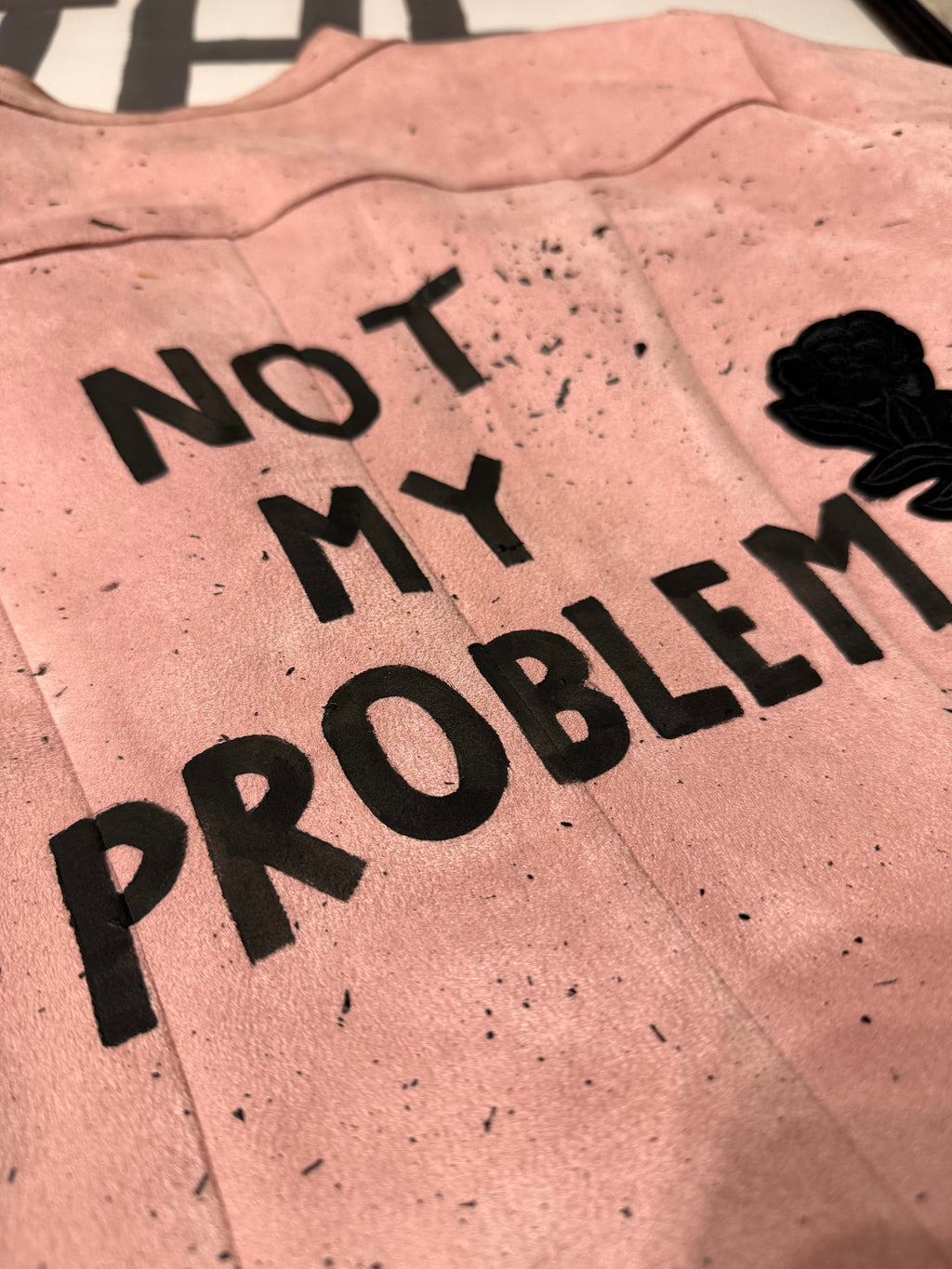 Giacca chiodo similpelle ‘Not my problem’