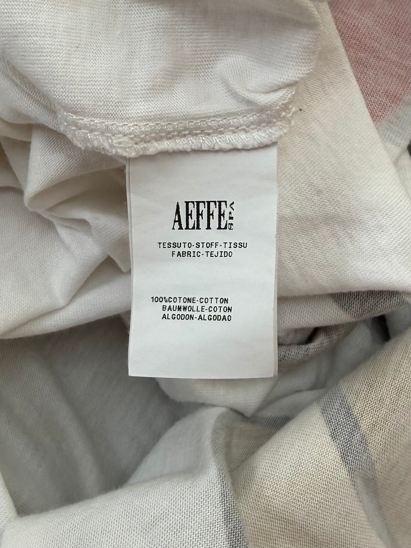 T-shirt over Moschino by Jeremy Scott